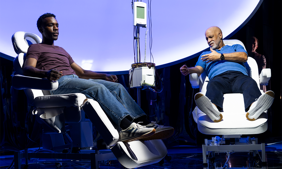 Jonny-James Kajoba and Michael Genet in Spare Parts. As their characters Ivan Shelley, an executive assistant, and Zeit Smith, a billionaire, they undergo a blood exchange. Photo by Russ Rowland