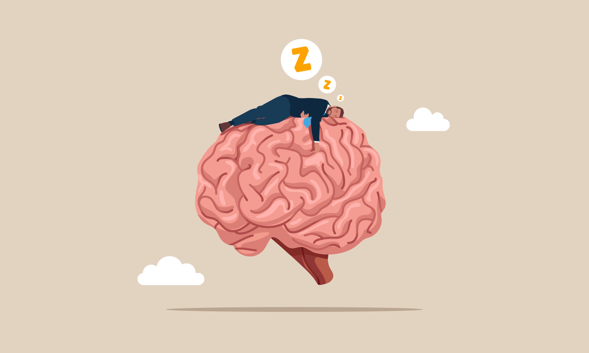 Illustration of a businessman sleeping on a human brain. Credit: Gannvector / Shutterstock.