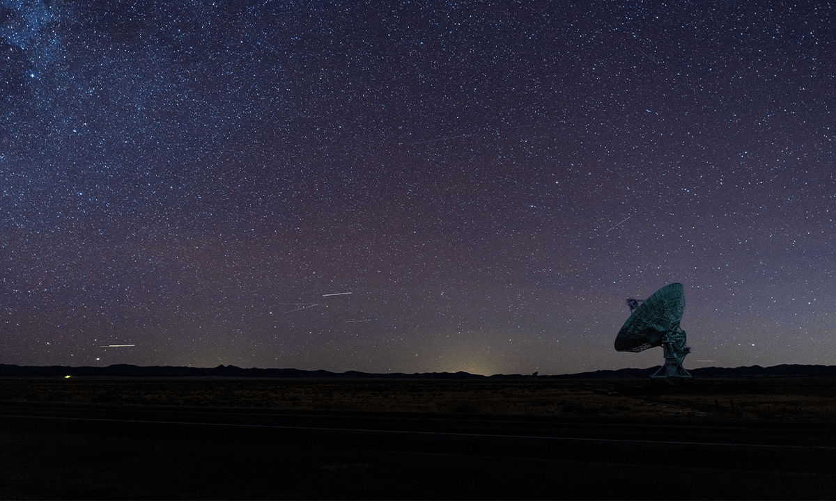 One of the 27 independent antennas that comprise the VLA is pictured scanning the night sky. Credit: BrianPIrwin / Shutterstock.