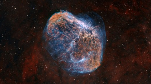 The Crescent Nebula: A Gas Bubble Surrounding a Violently Dying Star