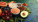 A photo of various "superfoods" including pomegranate and spinach.